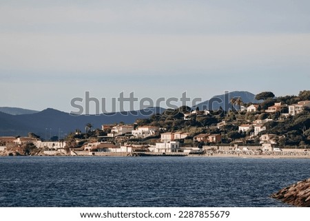 View of the mediterranean sea and Saint Tropez on a winter day from Sainte Maxime Royalty-Free Stock Photo #2287855679