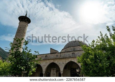 Old historical Habibi Neccar Mosque with its minaret in Antakya (Hatay) Turkey, on the blue sky background before the earthquake of 2023. Royalty-Free Stock Photo #2287856587