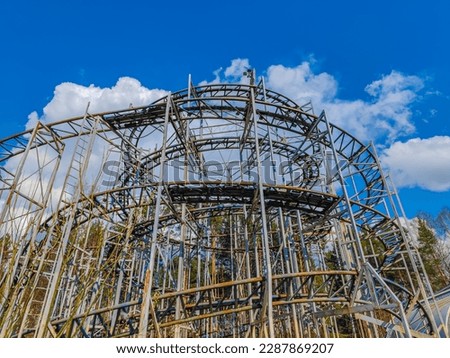 Abandoned rollercoaster in a park in middle of the city. Amusement park built during Soviet Union times in Elektrenai, Lithuania Royalty-Free Stock Photo #2287869207