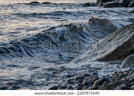 sea waves at sunset, West Vancouver, BC, Canada Royalty-Free Stock Photo #2287871649
