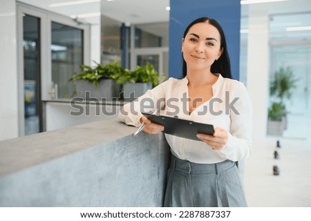 Picture of pretty receptionist at work
