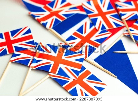the national union jack flag of great britian ,blue and red. Royalty-Free Stock Photo #2287887395