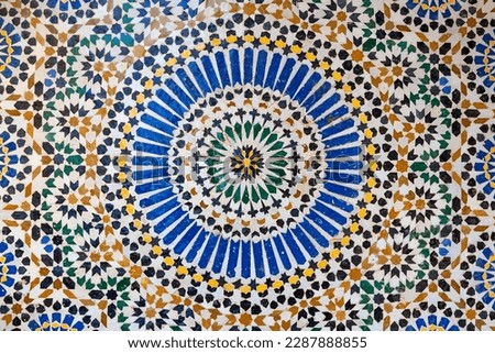textures of ancient moroccan ceramic mosaic with geometric and floral pattern