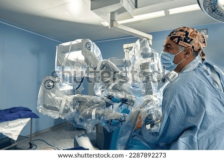 Surgery Da Vinci. Minimally invasive robotic surgery with the da Vinci surgical system. medical robot. Robotic Surgery. Robot-assisted medical operation. Medical operation involving robot. Royalty-Free Stock Photo #2287892273