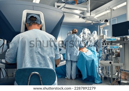 Surgery Da Vinci. Minimally invasive robotic surgery with the da Vinci surgical system. medical robot. Robotic Surgery. Robot-assisted medical operation. Medical operation involving robot. Royalty-Free Stock Photo #2287892279