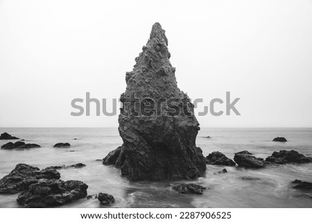 Black  White El Matador Beach Artistic, Pointy And Wet Rocks In Ocean With Clear Skies In Malibu California Pacific Ocean