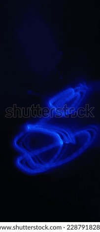 Abstract speed lighting night motion multiple colors with black background. Abstract technological background made of different element printed circuit board and flares. Depth of field effect and boke