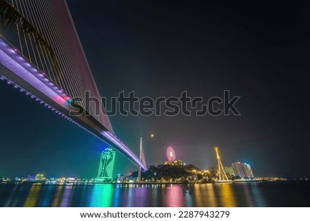 Bai Chay bridge night lights shimmering two peninsula connected Hon Gai and Bai Chay in Ha Long city, Quang Ninh province, Vietnam