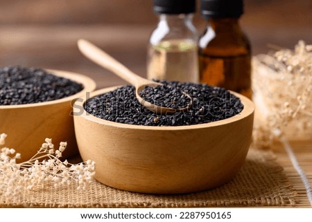 Black sesame seed and oil, Food ingredients in Asian cuisine Royalty-Free Stock Photo #2287950165