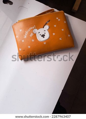 A photo of a cute stationery cloth box