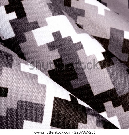 Camouflage pattern. Fashionable camouflage fabric. Military texture. Background