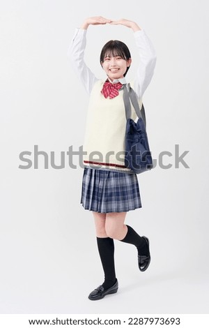 Asian high school student O sign gestures in white background