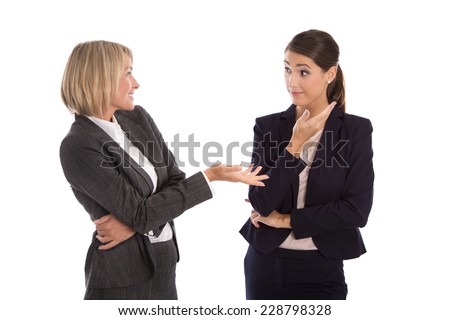 Two isolated businesswoman talking together: concept for body language. Royalty-Free Stock Photo #228798328