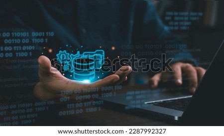 User can check data storage from SQL (Structured Query Language) database on computer screen with database and server room background. Royalty-Free Stock Photo #2287992327
