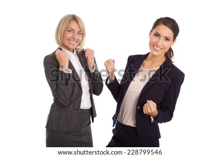 Team of two isolated business woman celebrating her success talking with hands and have fun.