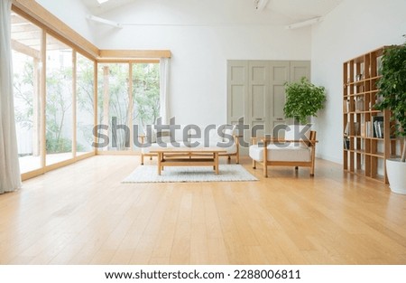 Unoccupied living room with furniture,