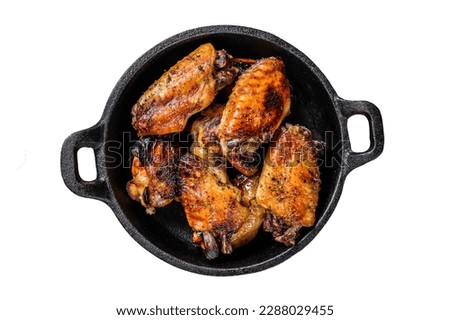 Barbecue chicken wings in honey sauce. BBQ poultry meat. Isolated on white background