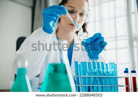 Modern medical research laboratory. female scientist working with micro pipettes analyzing biochemical samples, advanced science chemical laboratory 
 Royalty-Free Stock Photo #2288048503