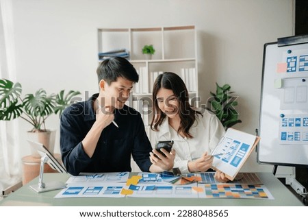  UX developer and ui designer brainstorming about mobile app interface wireframe design with customer breif and color code. business working

 Royalty-Free Stock Photo #2288048565
