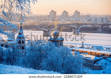 church and bridge in winter Royalty-Free Stock Photo #2288071309