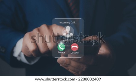Man answering to incoming from an unknown caller. Phone call from unknown number. Calling Incoming Communication Connect Concept. Royalty-Free Stock Photo #2288082409