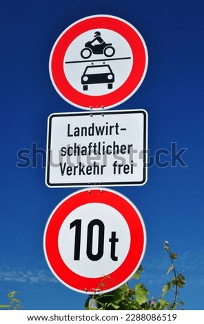 Close Up of German Road Sign Translated as 'Agricultural Vehicles Only' 