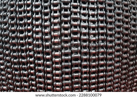 The background is made of iron chains. Metallic background. Metal texture