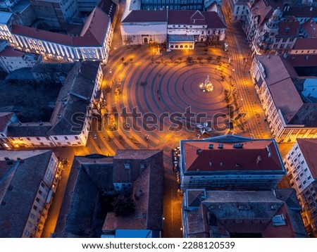 Liberty Square aerial view with the surrounding baroque style buildings. Photo was taken on the 5th of February 2023 in Timisoara, the European Cultural Capital of 2023, Timis County, Romania. Royalty-Free Stock Photo #2288120539
