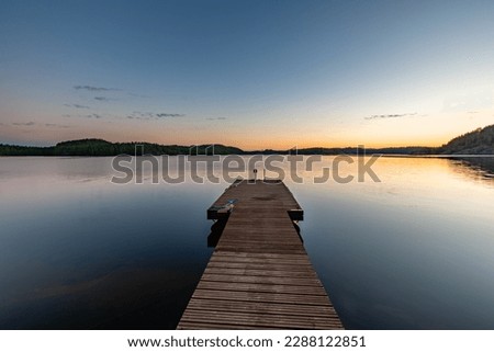Lake at sunset. Summer in Finland