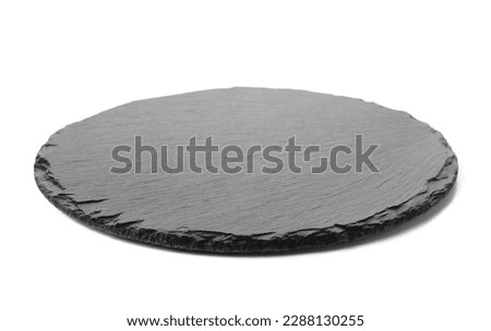 Round slate board isolated on white background Royalty-Free Stock Photo #2288130255