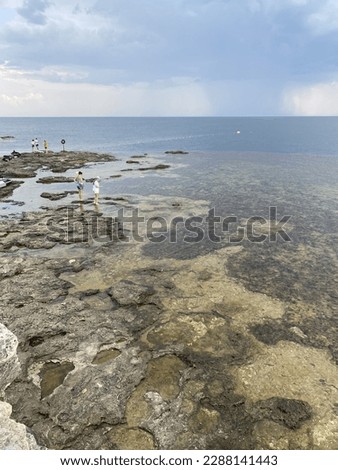 Natural landscape of the sea coast, pebble beach