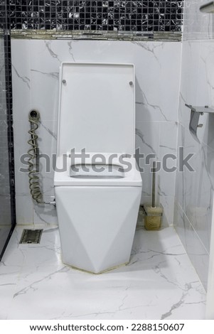 Toilet in the bathroom. ceramic toilet bowl indoors, top view .toilet bowl in bathroom. Toilet bowl in modern Restroom interior