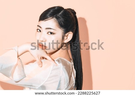Fashion portrait of young Asian girl.
