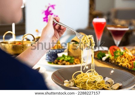 Pasta,spaghetti with amatriciana sauce in the dish on the wooden table  Royalty-Free Stock Photo #2288227157