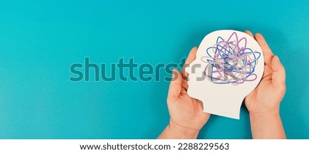 Hands holding human head, attention deficit hyperactivity disorder, ADHD symptom, mental health, confused mind  Royalty-Free Stock Photo #2288229563