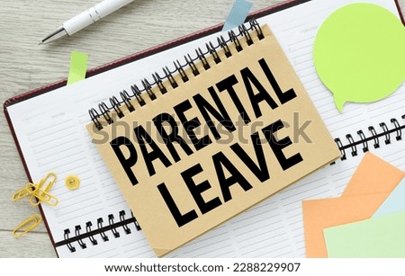PARENTAL LEAVE text on an open notepad. on the diary. Royalty-Free Stock Photo #2288229907