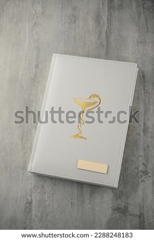 business notebook on wooden table