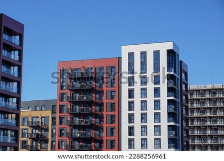 new residential development. exterior of high rise flats in UK city. Property market housing  Royalty-Free Stock Photo #2288256961