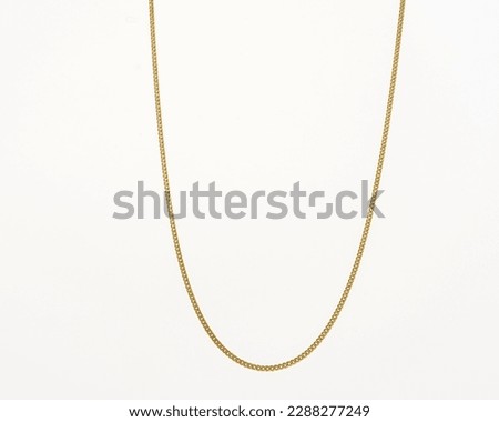 18k gold chain on white background