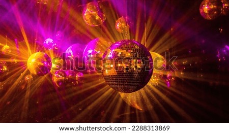 disco background with disco balls in purple and gold lighting Royalty-Free Stock Photo #2288313869