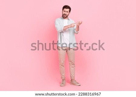 Full length photo of nice young male counting fingers match explain irritated wear trendy blue garment isolated on pink color background