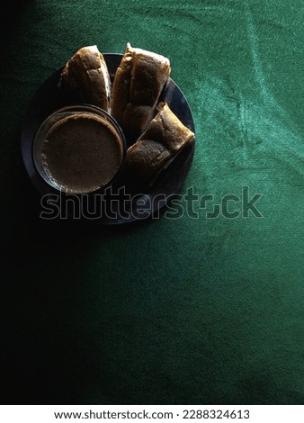 Coffee and Croissants on a Green Velvet Bed