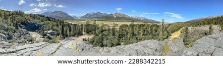 After completing climbing drills at Black Rapids Training Site, Basic and Advanced Military Mountaineering students enjoy this view Royalty-Free Stock Photo #2288342215