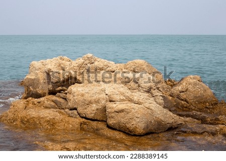 Rocks with sea and blue sky