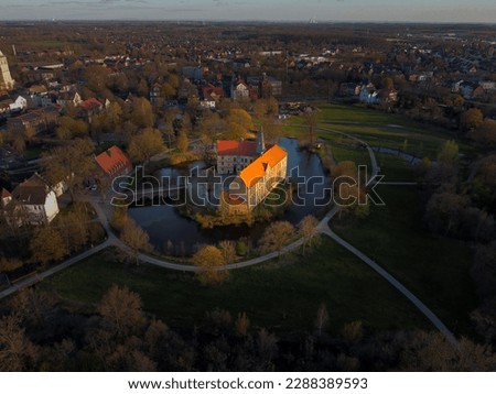 The castle of Lüdinghausen, a small german City near Münster. The photo is taken by a drone while sunset and reveals the beauty of the water castle.
