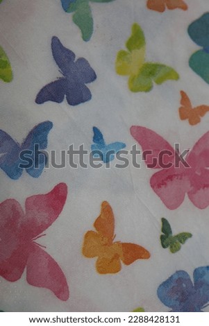 Colorful butterflies on white napkin paper close up background big size high quality instant prints stock photography