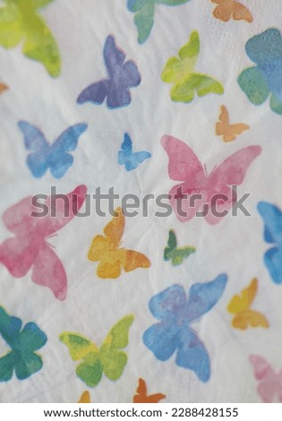 Colorful butterflies on white napkin paper close up background big size high quality instant prints stock photography