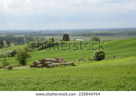 Classic Polish countryside, fields, meadows, lakes, hills, ponds, windmills.