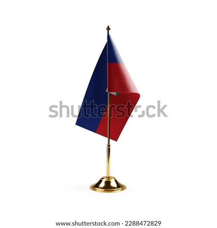 Small national flag of the Haiti on a white background.