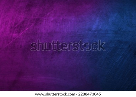 Ripped background, dark background with blue and magenta highlights, old and black textured background. Royalty-Free Stock Photo #2288473045